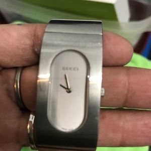 Swiss 2400L S. S., Water resistant Gucci watch.